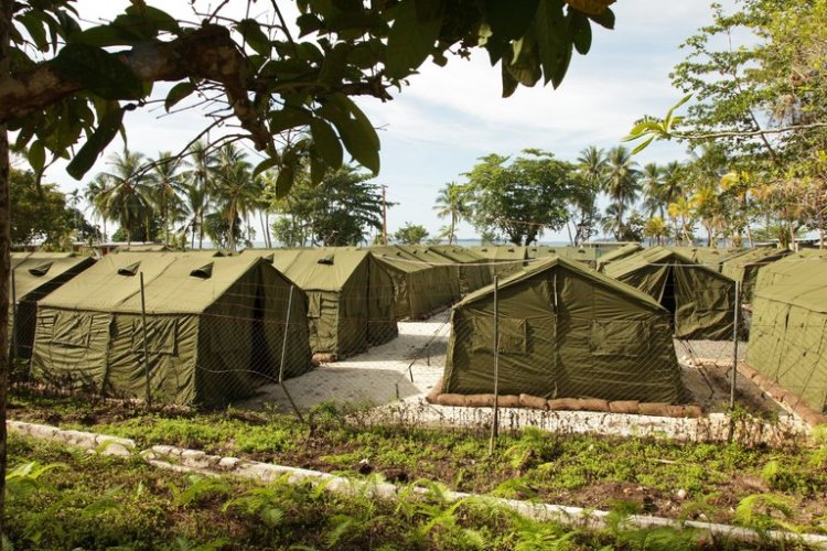 This Australian-run detention center for 800 immigrant/refugee men on Manus Island in Papua New Guinea was declared illegal yesterday by the highest court in PNG. The Australian government immediately declared that its immigration policies will not change. There are additional camps in Papua for women and children. Meanwhile we note that a photo of tents is not the same as a picture of human beings. (Australian Department of Immigration and Citizenship)