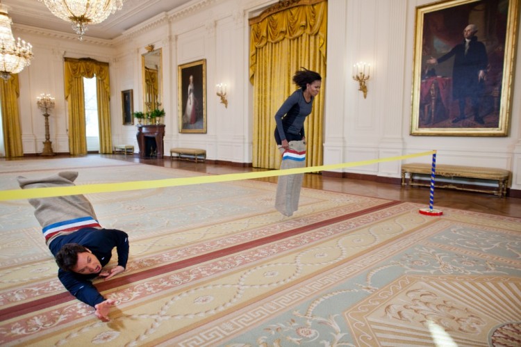 A sack race across the East Room of the White House, with George Washington calling Michelle Obama the winner over comedian and talk show host Jimmy Fallon. No matter what you've heard about the Obamas, she remains the most admired woman in America, not least because of episodes like this. (Chuck Kennedy/The White House)